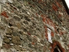 Fațada bisericii medievale de scol 14 de la Sînpetru (Valea Dinozaurilor din Țara Hațegului), dinspre colțul din Nord - Vest